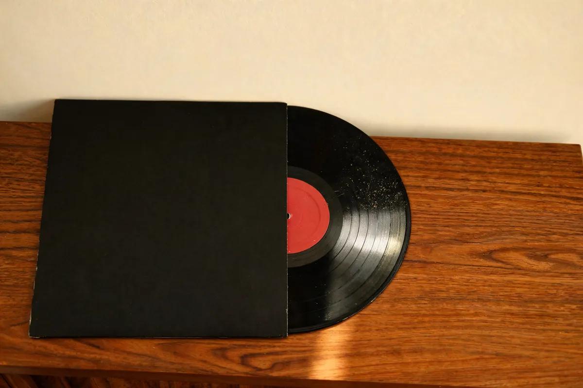 Turntable needle on vinyl in backstage light
